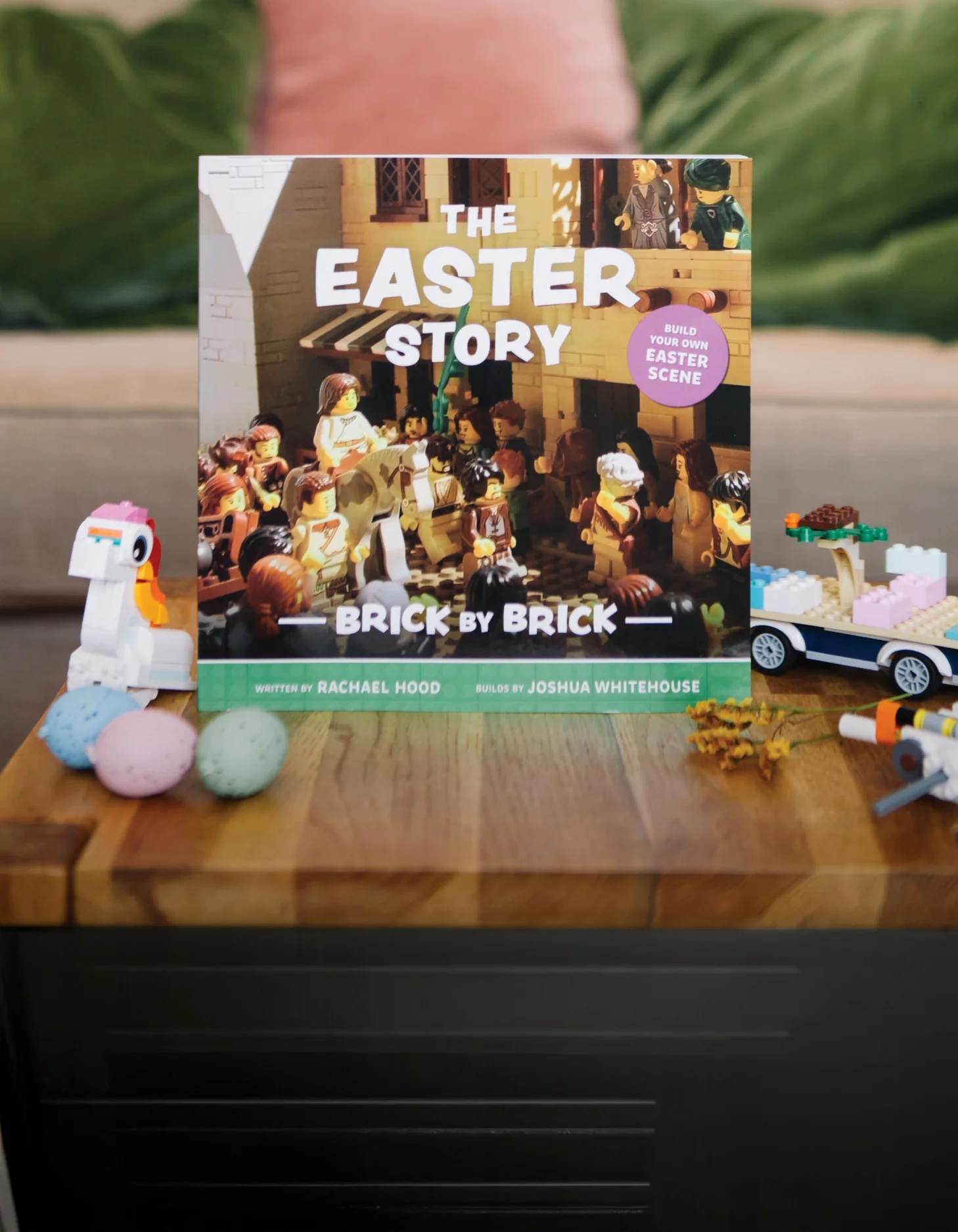 Photograph of The Easter Story Brick by Brick on a table with some other brick toys