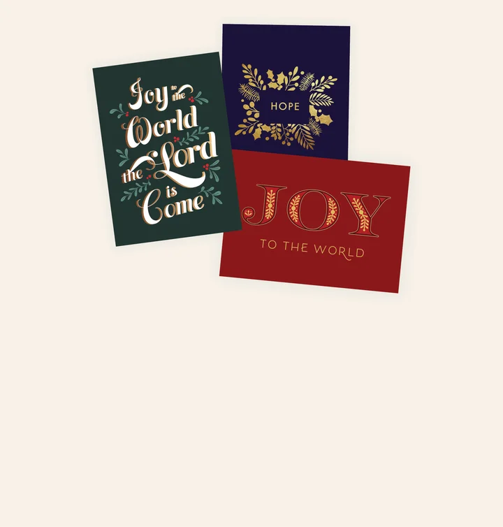 image of 3 different christmas cards, once that says "Joy", another says "Hope", and another that says "Joy to the World, the Lord is come". They are in different styles and different colors.