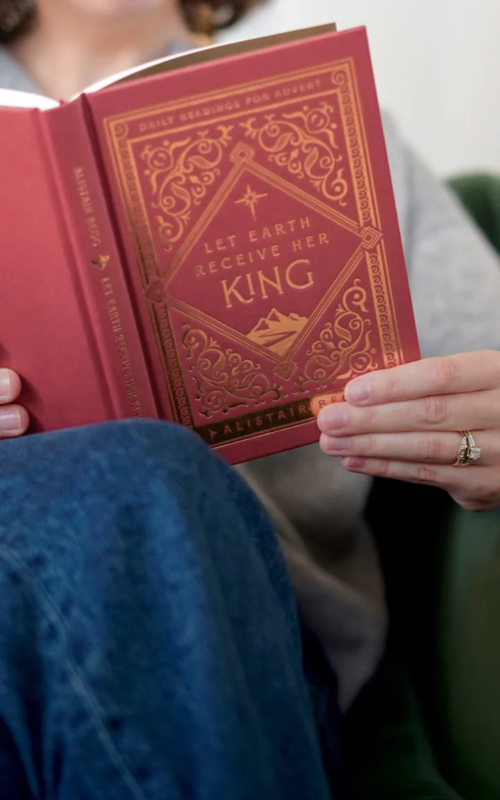 Photograph of an open devotional on a table
