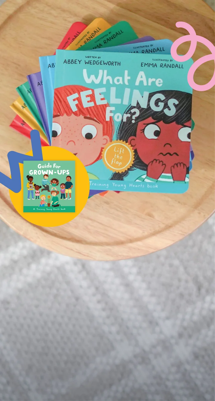 photograph of the board books in the Training Young Hearts Series with a roundel showing the Guide for Grown-up